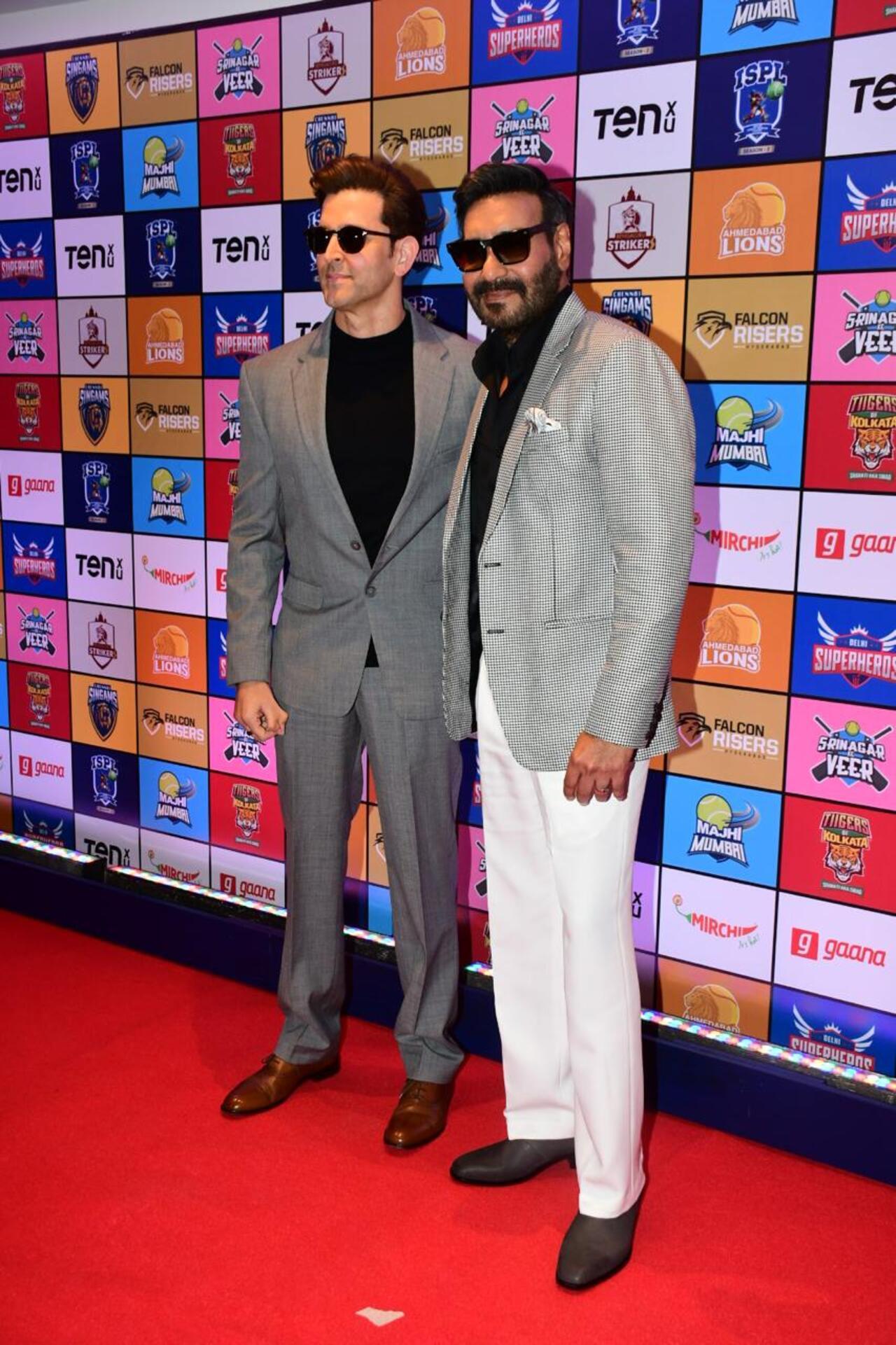 Hrithik Roshan and Ajay Devgn were spotted bumping into each other and later posing together at the player auction of Indian Street Premier League (ISPL) Season 3.